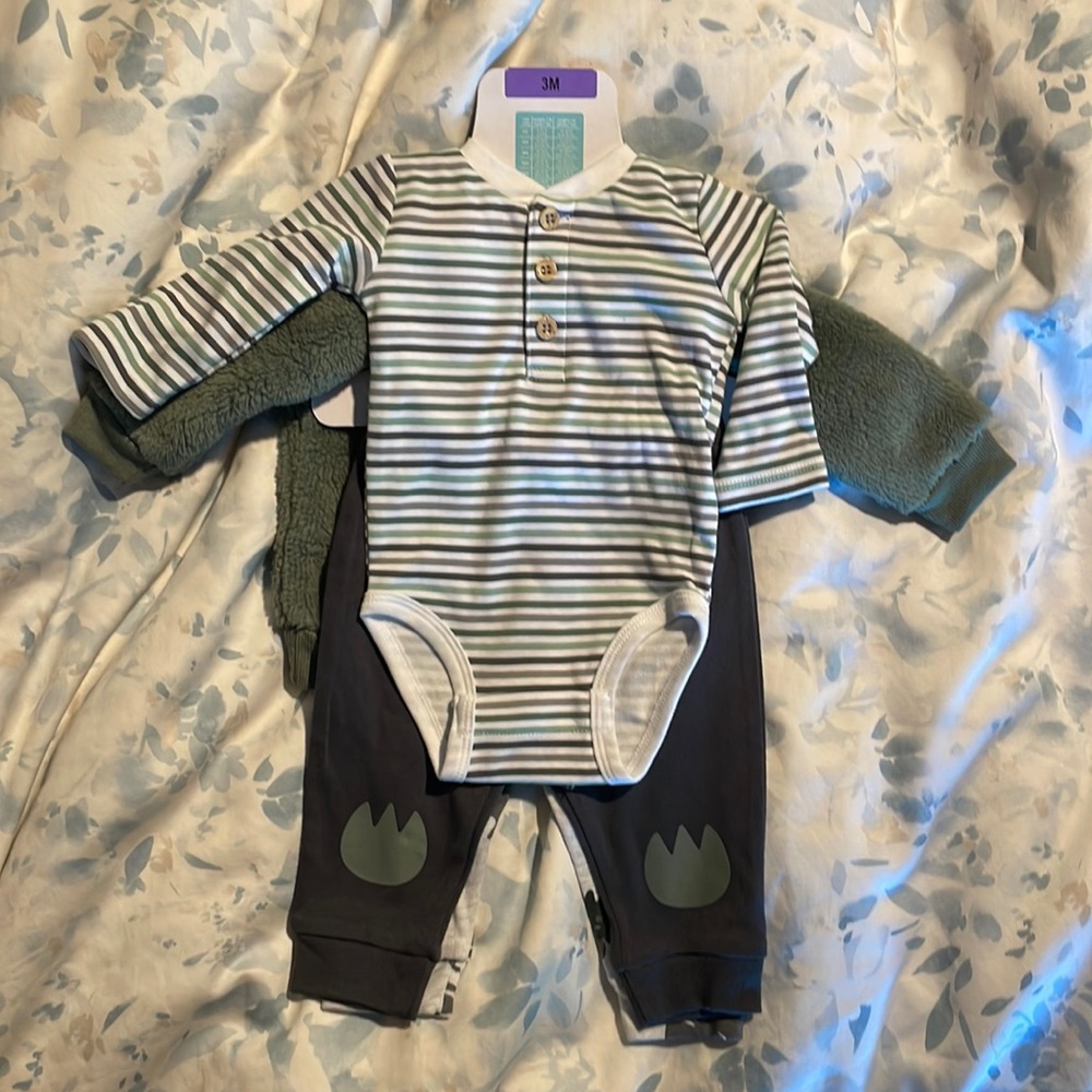 NWT 4 piece Dinosaur Onesie Set size 3 mo.